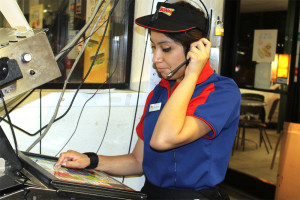 Senior Bryanna Longoria takes an order at a local Sonic restaurant. Longoria took extra shifts during the holidays.