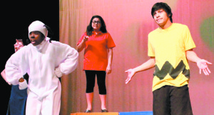 Senior Christian Martinez  performs alongside his castmates at dress rehearsal for the production of “Youre A Good Man Charlie Brown”. Martinez plays Charlie Brown, the lead role in the play.