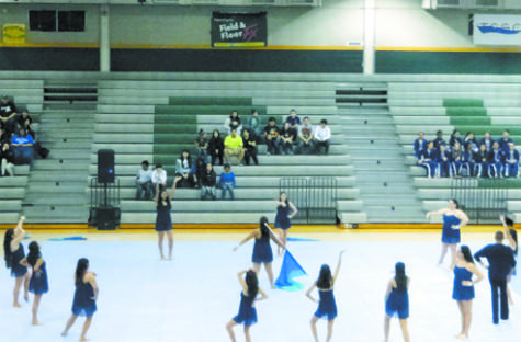 Winter Guard performs their routine at a competition in Cedar Park. They earned 6th place out of 9 at the competition.