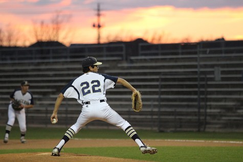 Senior Michael Garcia pitches in a game against Anderson in March. This year Garcia has been one of the main pitchers for the team.