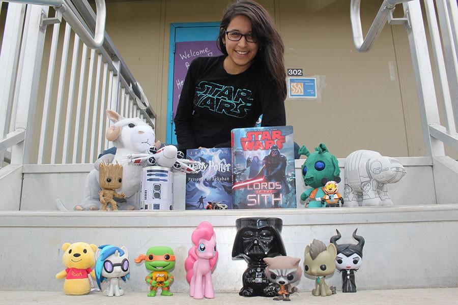 Health Science teacher Teresa Delgado shows off her collection of movie character figurines.