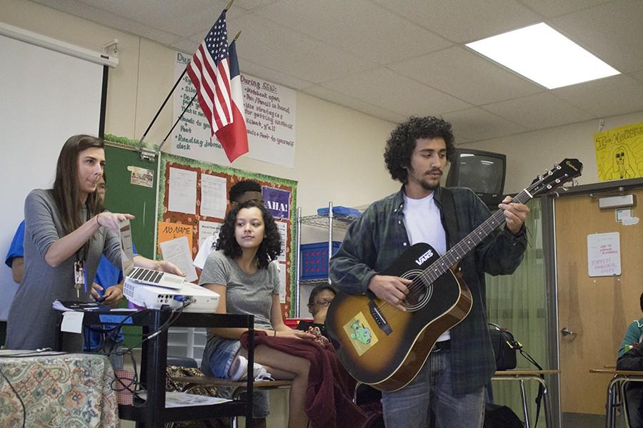 Senior Ruben Castro plays the guitar around students that participate in
Senior Issiah Harris’ “Wisdom of Art” FIT session. Students can get an
opportunity to share and express themselves in a way where they are
comfortable in room 232.