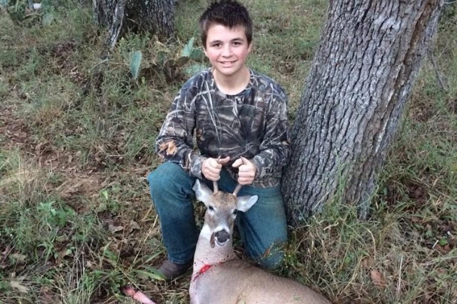  Student hunter, Noah McGonagil, poses with one his kills. McGonagil started hunting when he was about the age of 6. 