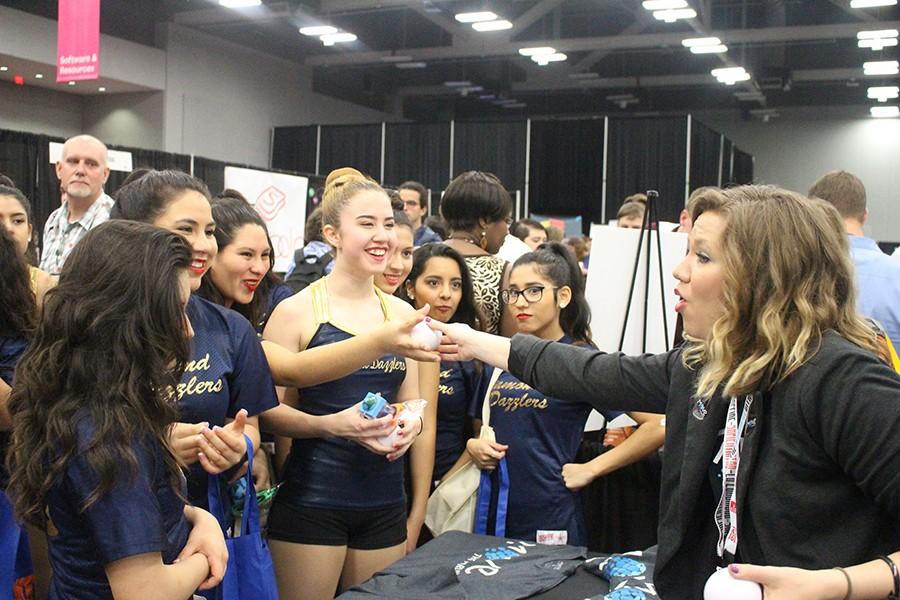 Diamond Dazzlers actively listen to a booth  about stress relief in school.