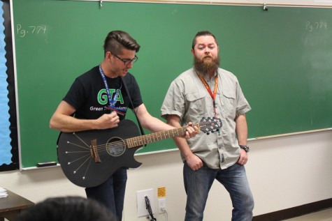 Hamm and Brooks perform a duet for Hamm’s 4th period geometry class. To watch our
Aurasma video follow Akins Eagles channel first.
