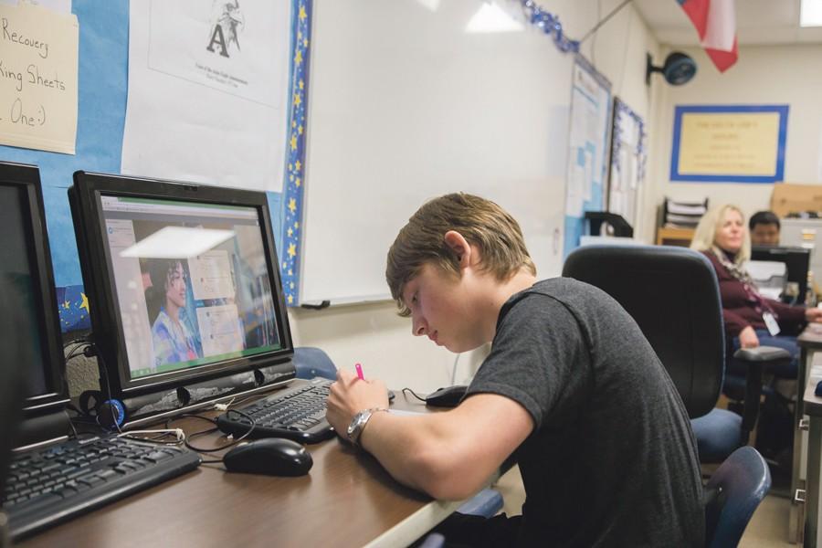 Sophomore Noah Hollingsworth works on completing an online module for one of his classes.
Students pulled into all-day DELTA recover their credits through these modules, providing a
different way of learning to make up credits they have lost. 