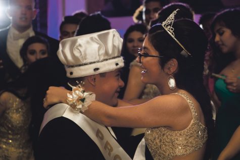 Senior Gio Castillero and Camille Cordova, dance at prom after being name King and Queen respectfully. The crowd cheer when they were crowned.