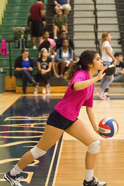 #7 Victoria Cavazos gets ready to spike the ball.