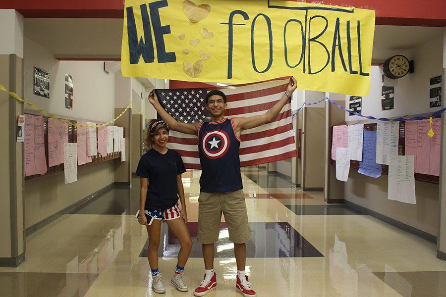 Students pose with the USA flag on Murica Monday for HOCO 2016.