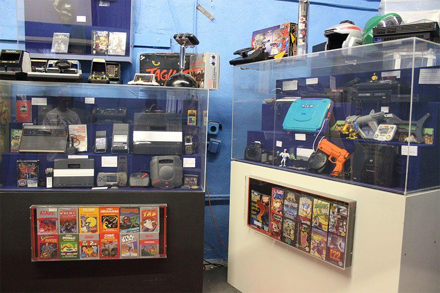 Caleb Zammit displays some of this classic video game consoles including an Atari, and a Jaguar. These items are a just few examples of the more than 20,000 pieces in his collection.