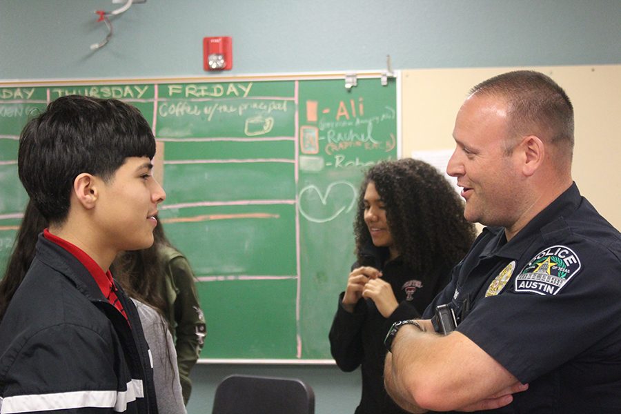 Officer+Joshua+Visi+speaks+to+freshman+Domanick+Flores+during+a+story+sharing+group+activity.+The+Restorative+Justice+program+has+officers+come+in+every+Friday+to+build+community+relationships+between+officers+and+teenagers.