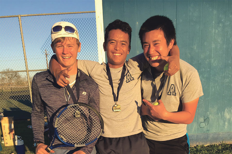 Connor Harkins, Simon Carandang, and Kyle Nguyen pose for a photo after their big tournament sweep.