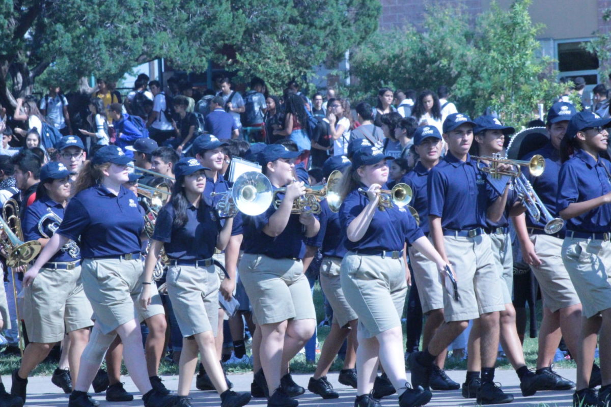 Members of the Akins Band leads the way to the courtyard at the end of the school day on September 14.