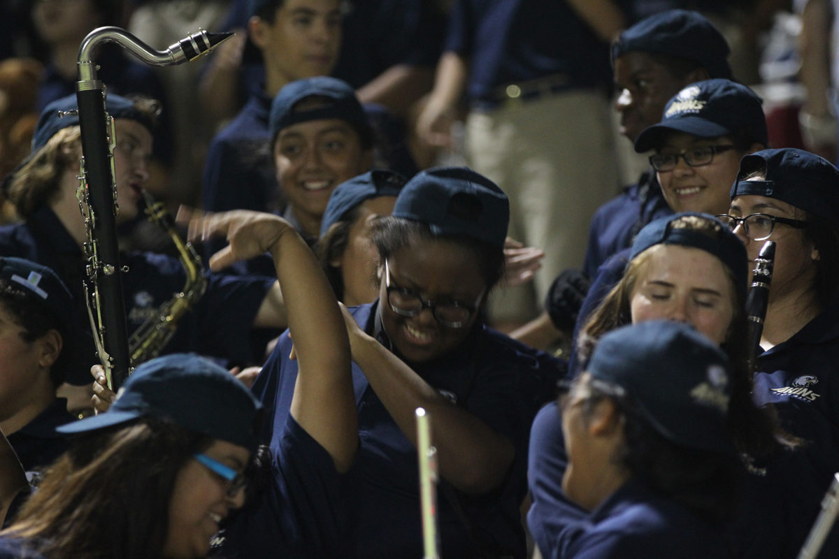 Freshman Jalyn Ellison dancing along to the drumline’s cadences with members of her section on September 21st at Housepark.