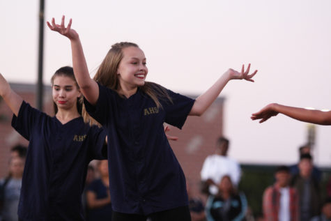 Akins Sapphire dances her way across the courtyard at Blue and Gold night.