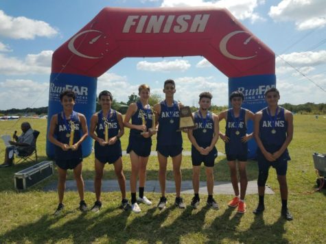 Cross Country boys win first district championship and make history