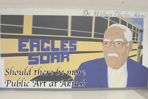 A mural of school namesake Dr. W. Charles Akins greets students near the main entrance. It was recently painted after administrators removed unused lockers from the wall.