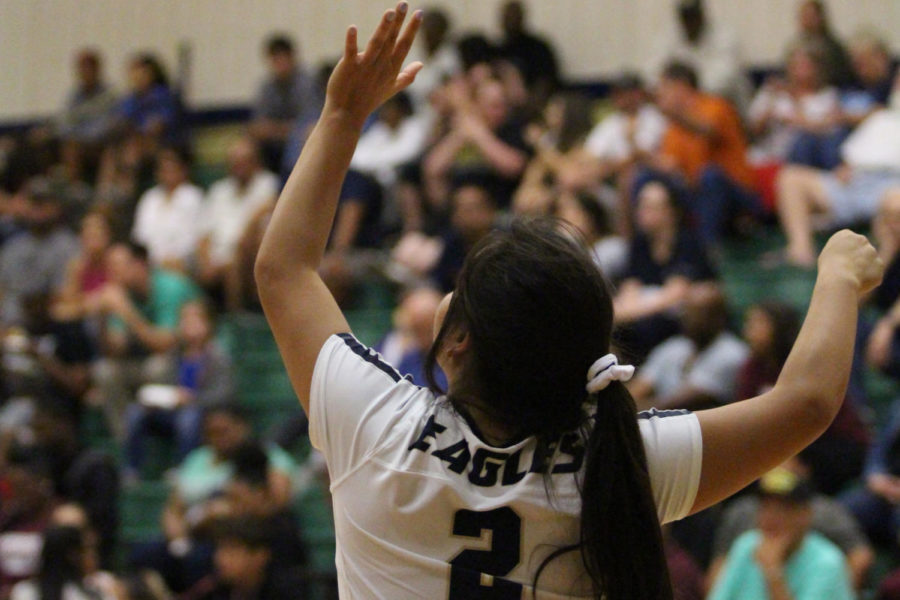 Senior Delia Quiroz serves the ball
at an Austin High match. Akins won
with a score of 3-2.