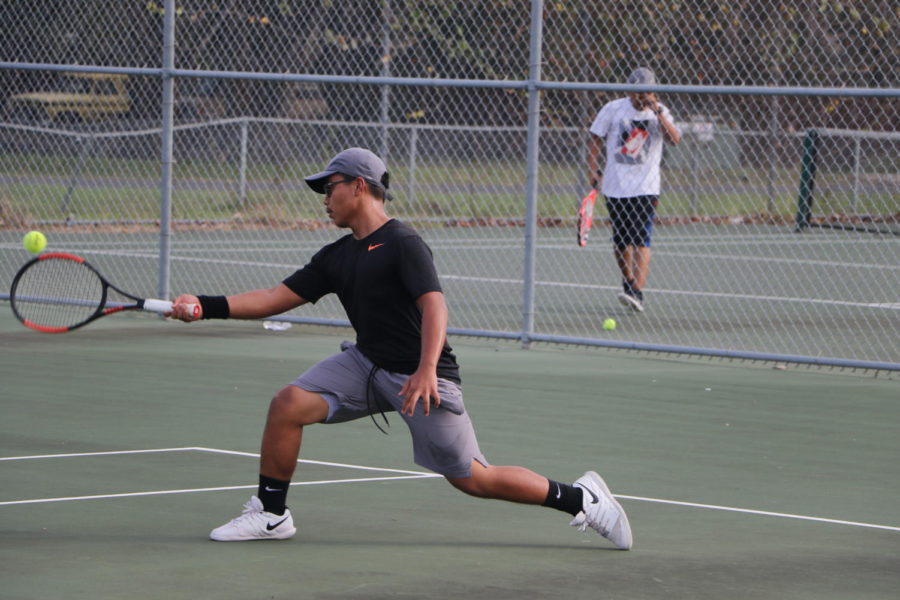Tennis team works to improve season, makes it to district