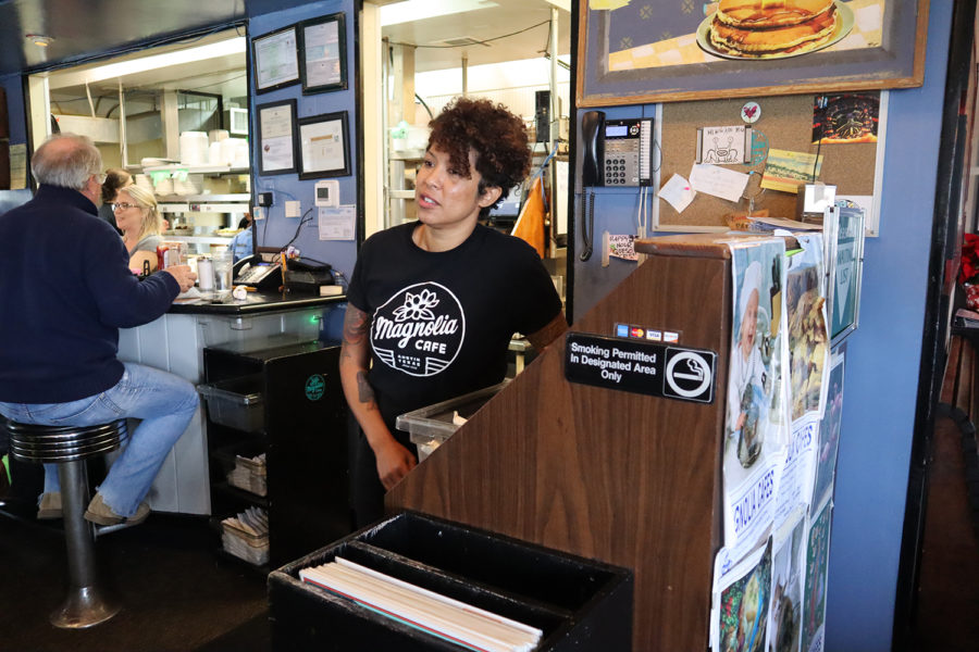 Ebone Zamarron works a hosting shift at Magnolia’s Cafe to earn extra cash to help provide
for her two daughters. She also works another job for some extra spending cash.