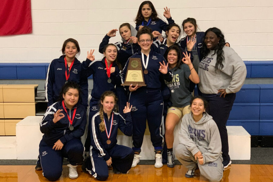 The+girls+varsity+wrestling+team+won+the+district+championship+on+Feb.+8.+Ten+Akins+wrestlers+will+advance+to+compete+at+regionals+this+weekend.