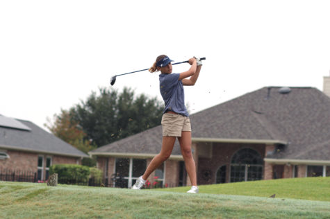 Freshman Riley Romero tee’s off to start off her golf tournament. She worked to finish as a top freshman.