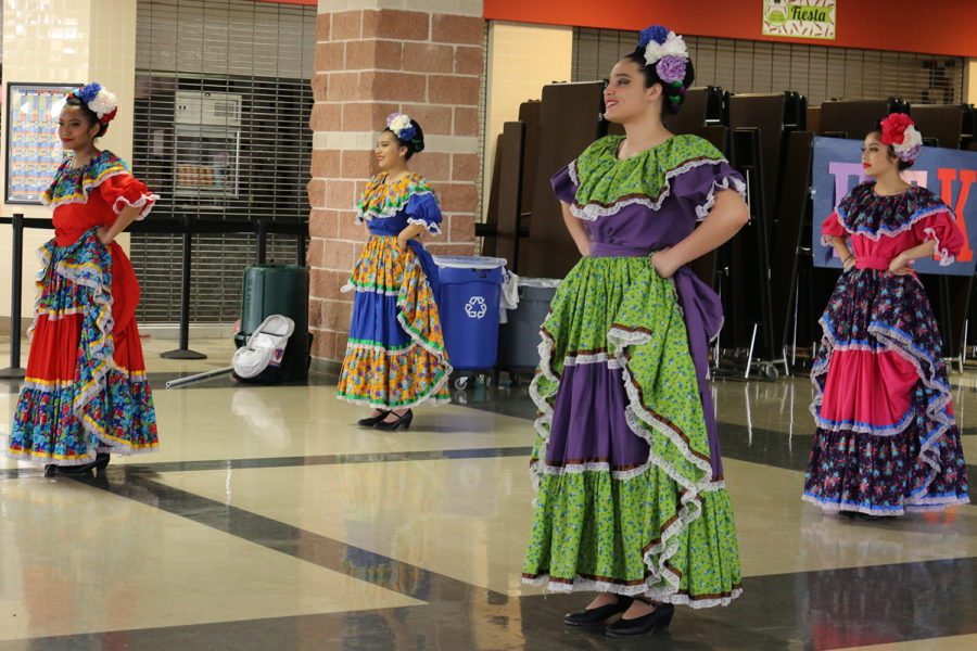 Students (members of Ballet Folklorico) prepare to perform as the second act of the evening at AkinsTHON.

