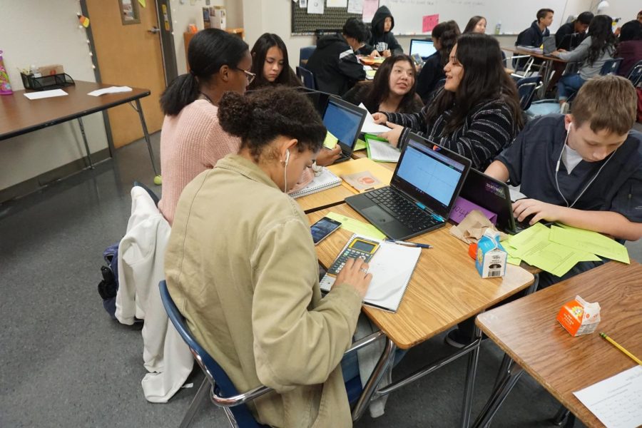 Students work during Elisha Aldanas 5th Period Pre-AP Algebra class. All freshmen that belong to the Early College High School program must take Pre-AP core classes.