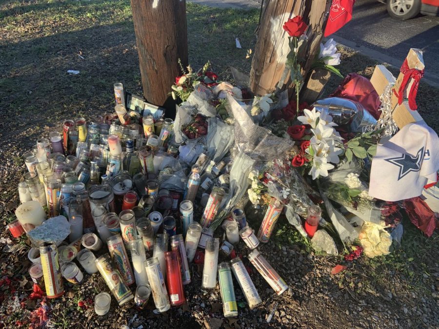 Candles are left at the site of the accident on Bluff Springs Rd.