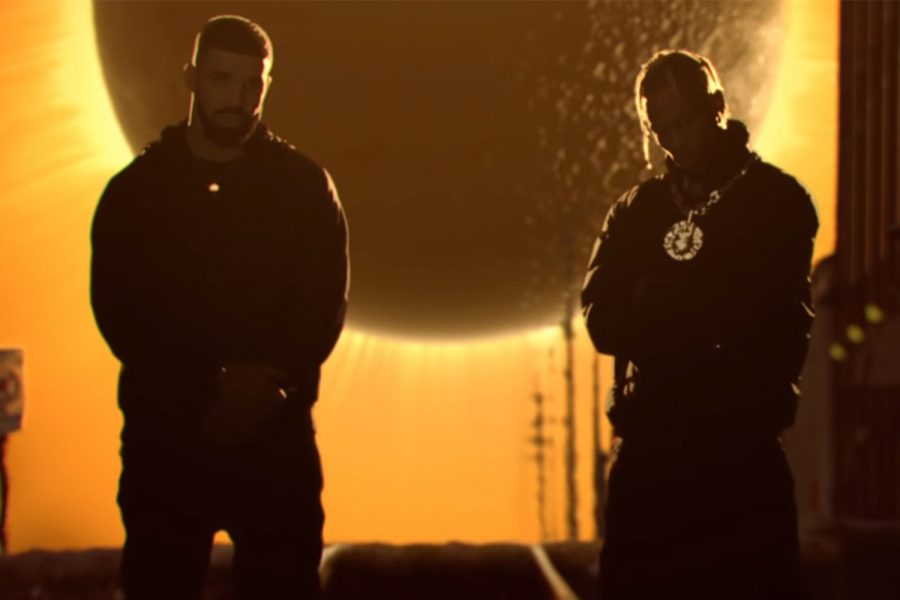 Travis Scott and Drake pose in front of the sun for their Sicko Mode music video. This single from Scotts sophomore LP debuted at number one on the Billboard Hot 100.