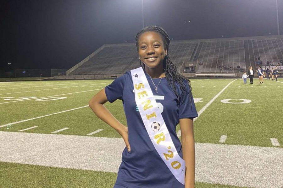 Uchechi Asika,who recently received the Gates Millennium Scholarship, poses during Senior Night for the Varsity Girls Soccer Team. The scholarship pays for the chosen student’s college education all the way up to a doctorate degree.