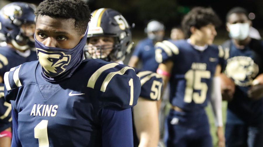 Eagels sporting the masked look- Punter Josh McCormick wears a face masks while on the sidelines during the game against Del Valle to keep others safe from the coronavirus.