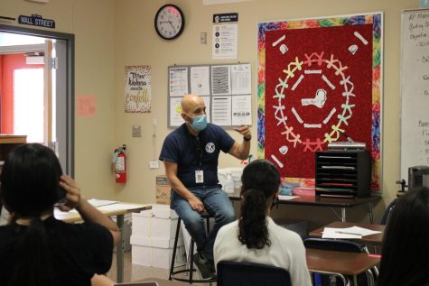Social studies teacher Henry Perez leads a Key Club meeting after school in his classroom. Key Club focuses its efforts on community service.