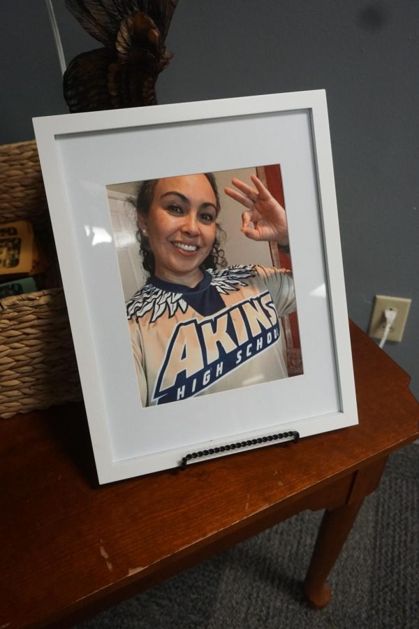 A framed photo of Christina Garcia-Mata sits in the Akins front office. Many teachers display photos of her to keep her memory alive.