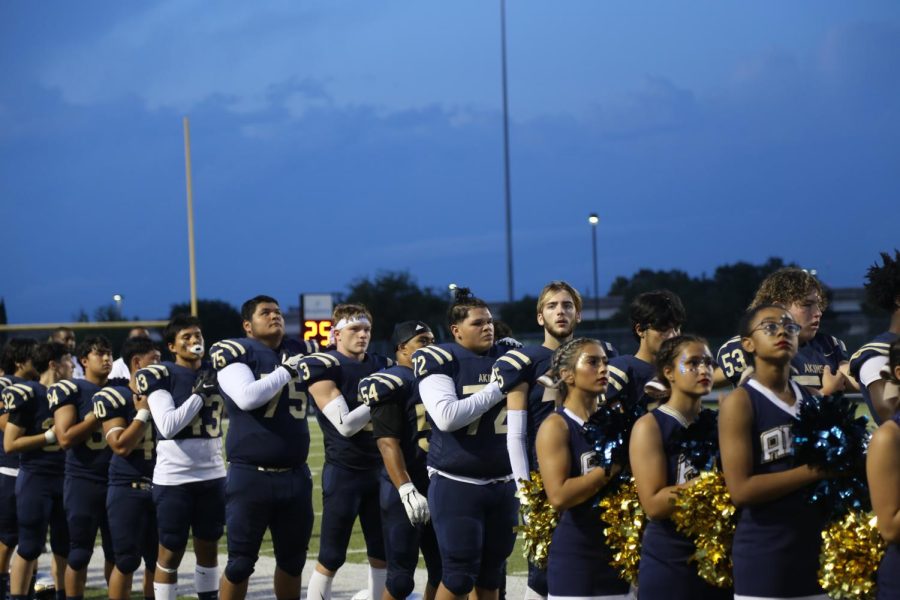 Akins gets ready to battle against Austin High on the night of the Homecoming Game.
