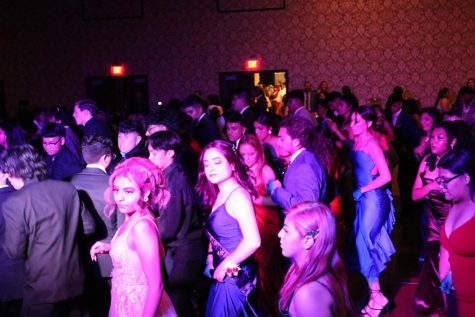 Seniors and prom guests dance to the Cupid Shuffle in the Texas Ballroom at the Hyatt Regency on May 7.