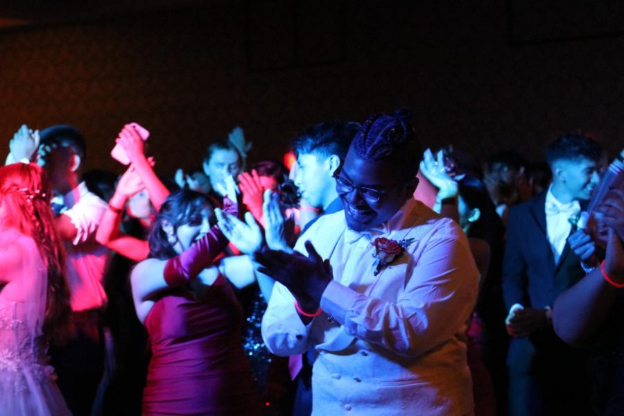 Seniors Natalie Rodriguez and Dedrick Land dance the night away at the Senior Prom held at the Hyatt Regency on May 7. 