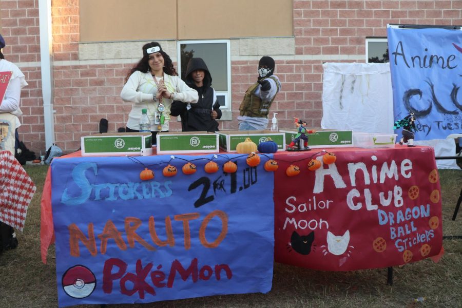 The anime club sets its booth alongside other clubs selling pop-culture-themed stickers.