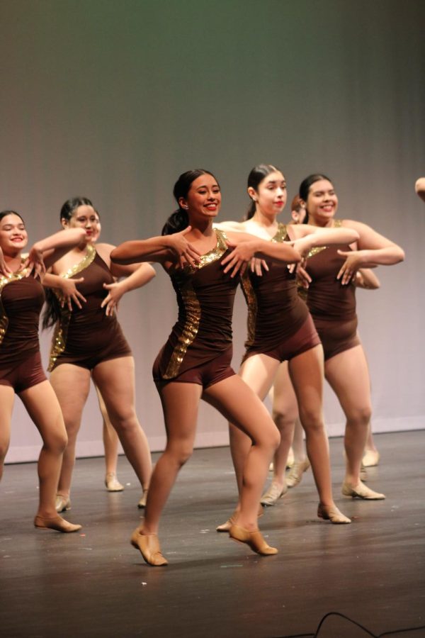 Lupe Vences and the Diamond Dazzlers dance to Hot Chocolate at the Fine Arts Showcase.