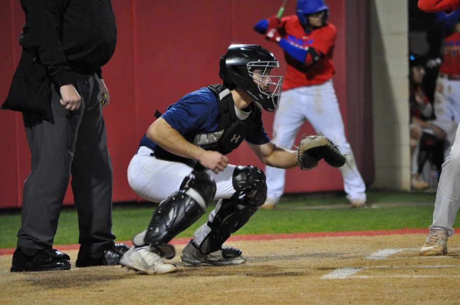 Junior David Cisneros plays along the varsity baseball team during a scrimmage.