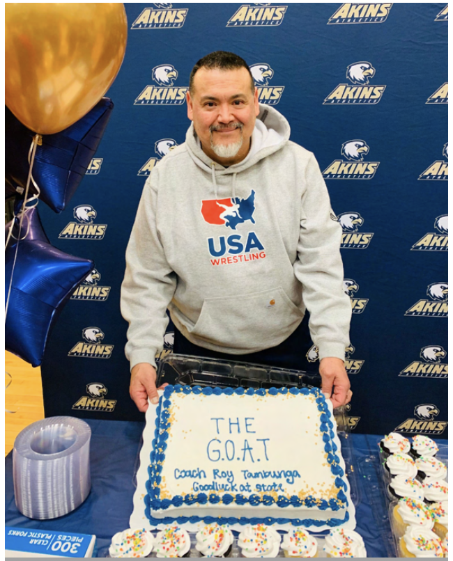To celebrate Tambunga’s 20-year streak, the Akins coaching staff presented him with a GOAT cake to recognize his status as the “Greatest of All Time” at Akins during a sendoff event for Toepte before she traveled to the state tournament.