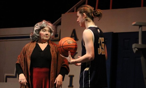 Freshman George Whitehurst, who plays Troy Bolten, acts in a scene with theater teacher Le Easter, who plays Ms. Darbis.
