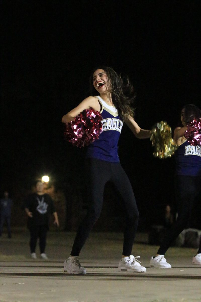 Ariana Guzman Yanez performs in front of students and teachers in the courtyard at Blue and Gold night on Oct. 30.